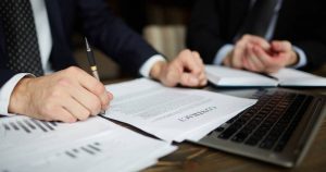 businessman-reading-contract-closeup(1)