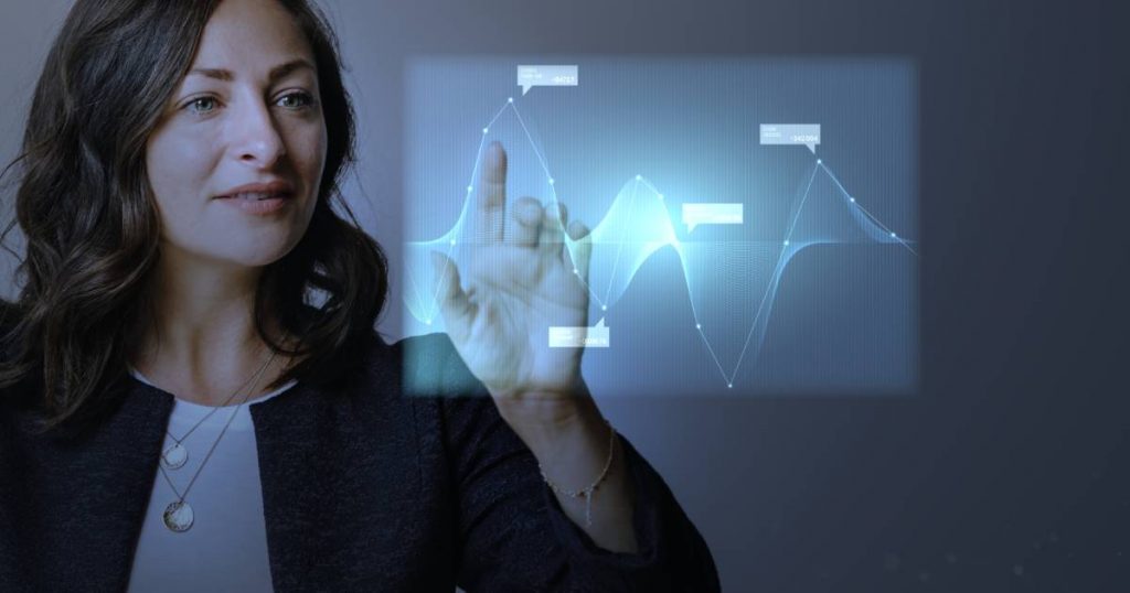 high-technology-digital-graph-presentation-by-a-businesswoman(1)
