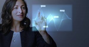 high-technology-digital-graph-presentation-by-a-businesswoman(1)